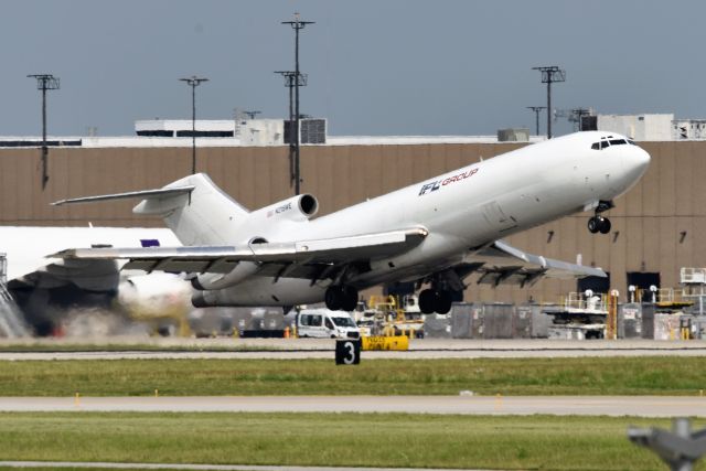 Boeing 727-100 (N215WE) - Line # 1830 out of 1832. S/N # 22936. Built in 1984 for FedEx, originally N215FE. Here she is, airborne after a surprisingly short takeoff run of less than 3000 feet. Climbed like a bat out of hell with it's tail on fire!. Departing 23-L on 07-15-21.