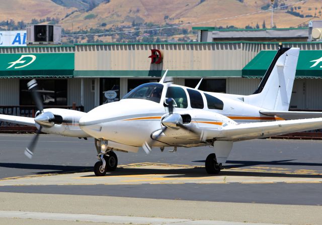 Beechcraft 55 Baron (N70MB) - Baron 55 from Central California started up and preparing for taxi out and departure at Reid Hillview.