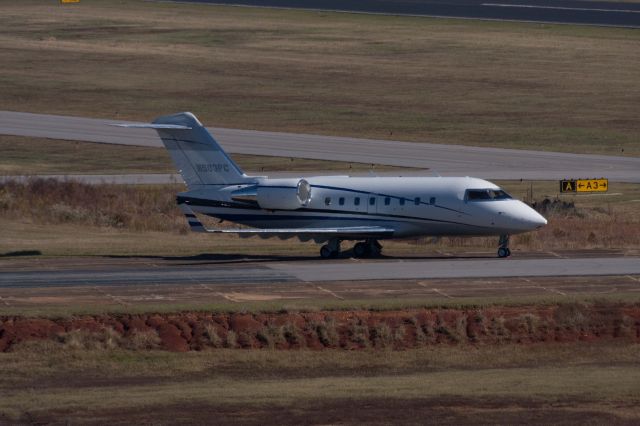 Dassault Falcon 50 (N503PC) - Photo taken from the back grandstands at the speedway