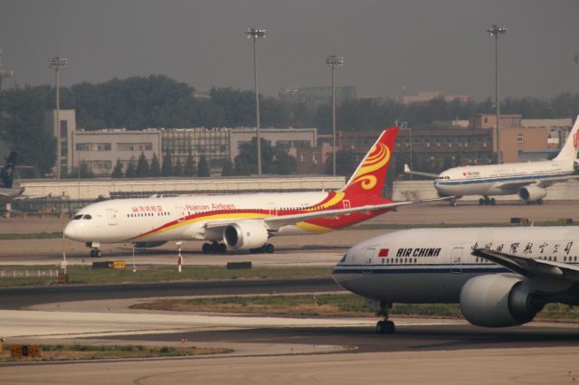 Boeing 787-9 Dreamliner (B-7667) - 06/23/18 Hainan Dreamliner and Air China B77W each wait for their turn on Rwy 36R