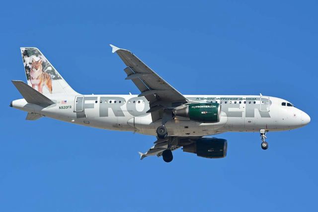 Airbus A319 (N920FR) - Frontier Airbus A319-111 N920FR Carl the Coyote at Phoenix Sky Harbor on December 22, 2017.