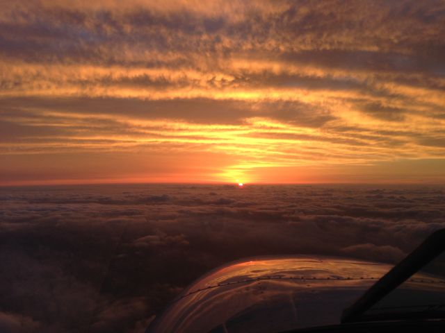 Beechcraft Baron (58) (N609G) - Departing San Marcos in my Baron early in the morning...heading into the sunrise over Austin.