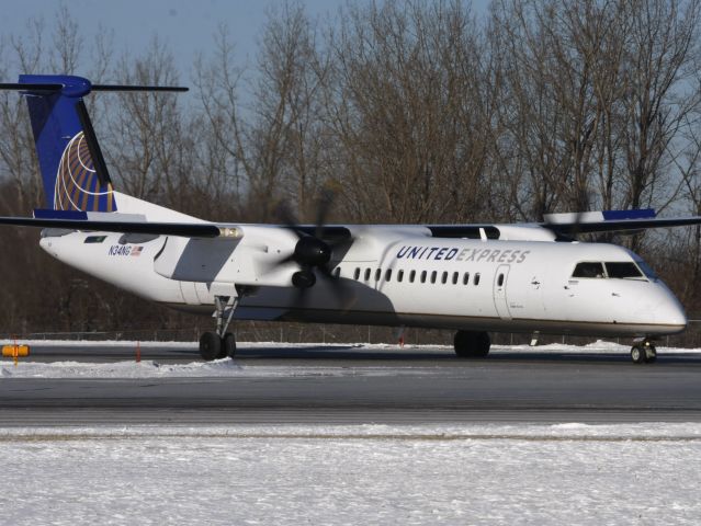 de Havilland Dash 8-400 (N34NG) - Colgan Air latest Q400 delivered Dec 16, 2010, taxiing to position and hold on Rwy 25.