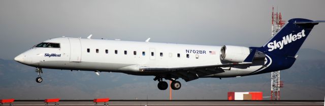 Canadair Regional Jet CRJ-200 (N702BR) - Landing on 16L.