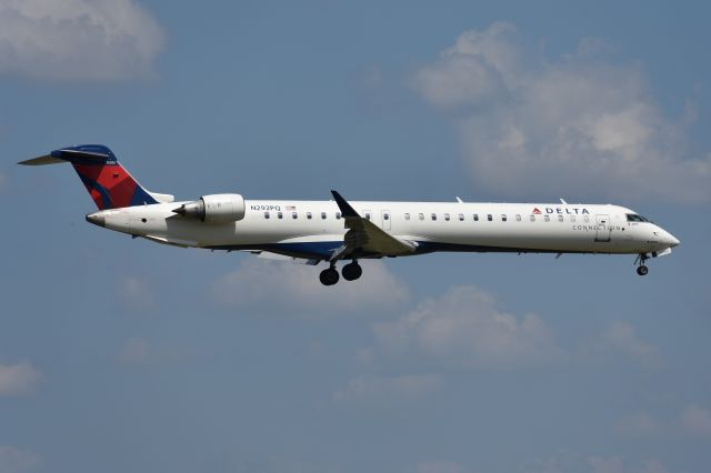 Canadair Regional Jet CRJ-900 (N292PQ) - Delta Connection. Taken May 28 2018 from Founders Plaza at DFW.