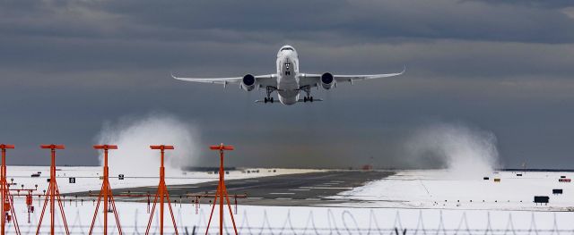 Airbus A350-900 (9V-SMW) - Singapore Airlines Airbus A350 departing snowy YVR January 1st 2022 with jet blast vortices below.