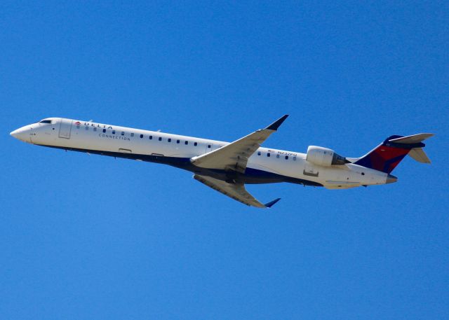 Canadair Regional Jet CRJ-900 (N232PQ) - At Shreveport Regional.