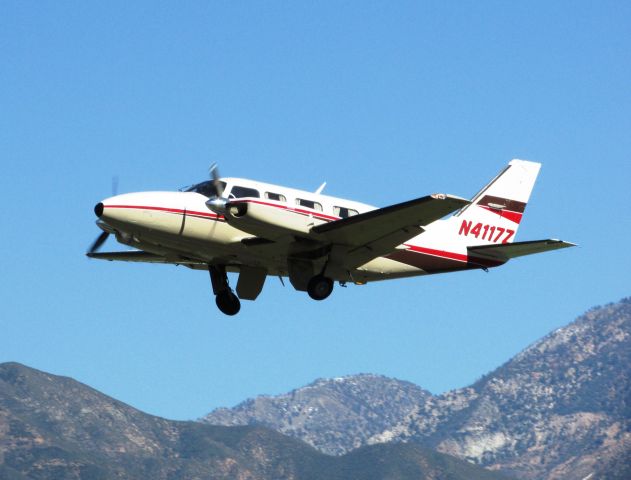 Piper Navajo (N4117Z) - Taking off RWY 26L