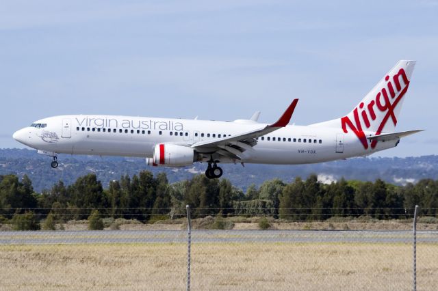 Boeing 737-800 (VH-VOK) - About to put down on runway 05. Friday 19th April 2013.