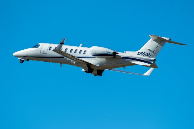 Learjet 45 (N769TM) - Departing KFMY