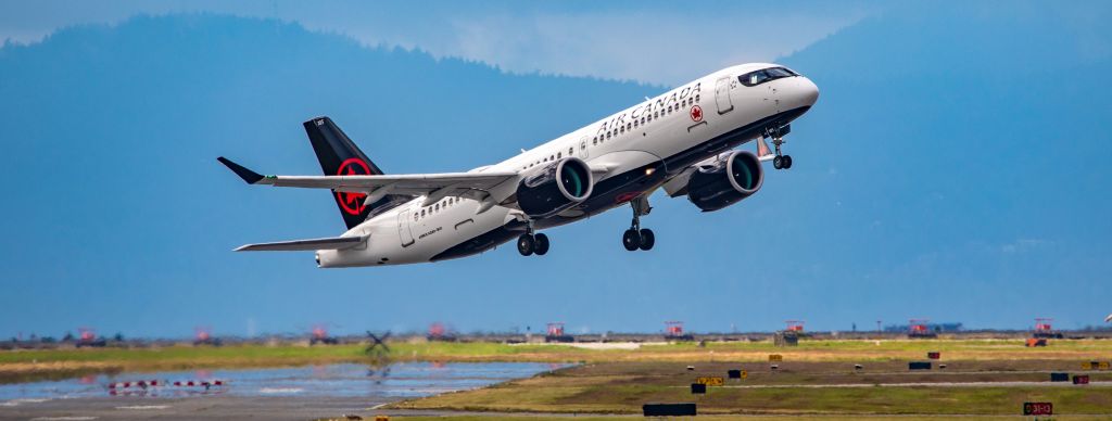 Airbus A220-300 (C-GJXW) - Early rotation paid off for this photo of an Air Canada Airbus A220-300 departure at YVR for YUL