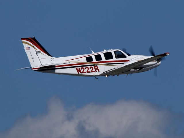 Beechcraft Baron (58) (N222R) - Departing BTV 28 Aug 2022