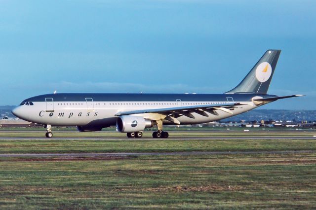 Rockwell Commander 114 (VH-YMK) - COMPASS AIRLINES (MONARCH AIRLINES) AIRBUS A300B4-605R - REG : VH-YMK (CN 556) - WEST BEACH ADELAIDE SA. AUSTRALIA - YPAD (20/7/1991) 35MM SLIDE CONVERSION.