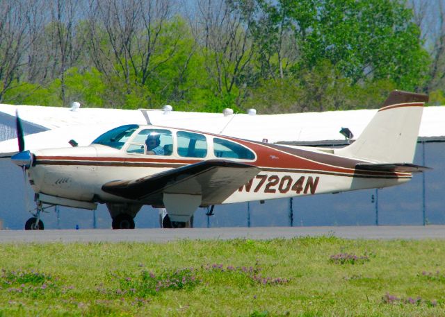 Beechcraft Bonanza (33) (N7204N) - At Downtown Shreveport. 