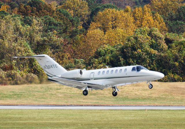 Cessna Citation CJ3 (N304TC) - N304TC is a 2015 Cessna Citation 525B seen here departing Atlanta's PDK executive airport. I shot this with a Canon 100-400mm IS II lens at the focal length of 330mm. Camera settings were 1/6400 shutter, F5.6, ISO 800.  Please check out my other photography. Votes and positive comments are always appreciated. Questions about this photo can be sent to Info@FlewShots.com