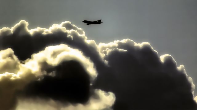 Boeing 747-400 (4K-SW888) - Up in sky, from my window.