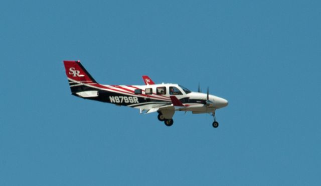 Beechcraft Baron (58) (N979SR) - Base to final for 09 at Carson City