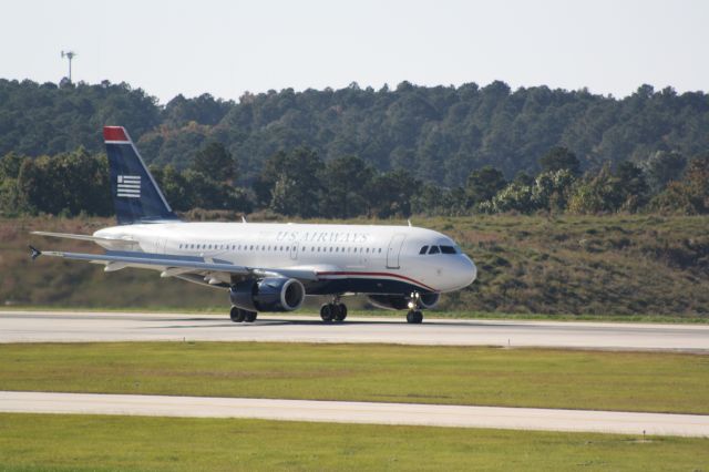 Airbus A319 (N829AW) - 829AW on landing rollout rwy 5L at RDU