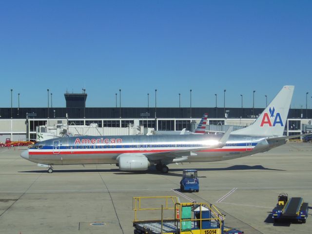 Boeing 737-800 (N848NN) - American Airlines (AA) N848NN B737-823 [cn31103]br /Chicago O’Hare (ORD). American Airlines flight AA1200 just arrived from Washington RR National (DCA). This classic bare metal livery, first deployed in the late 1960’s was replaced by a new white livery in 2013 following the merger with US Airways (This aircraft was repainted in May 2017).br /Taken from the terminal. br /2015 10 14  a rel=nofollow href=http://alphayankee.smugmug.com/Airlines-and-Airliners-Portfolio/Airlines/AmericasAirlines/American-Airlines-AAhttps://alphayankee.smugmug.com/Airlines-and-Airliners-Portfolio/Airlines/AmericasAirlines/American-Airlines-AA/a