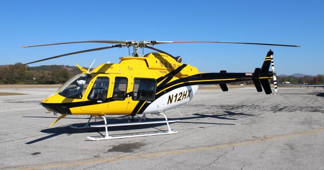 Bell 407 (N12HX) - A Helicopter Express Bell Eagle 407HP on the ramp at Anniston Regional Airport, AL - November 7, 2023.