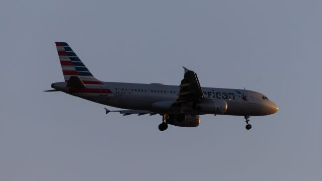 Airbus A320 (N653AW) - American Airlines A320 landing at PHX on 3/16/2022. Taken with a Canon 850D and Sigma 150-600 Contemporary lens.