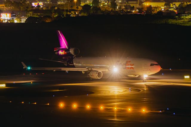 Boeing MD-11 (N594FE) - FedEx MD11 taking off at PHX on 12/10/22. Taken with a Canon R7 and Tamron 70-200 G2 lens.