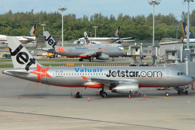 9V-JSK — - A comparison between Jetstar's old and new livery.