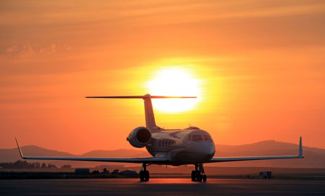 N25VG — - A Gulfstream IV parked in Coeur dAlene, Idaho. A small wildfire out to the west made for a beautiful red sunset.