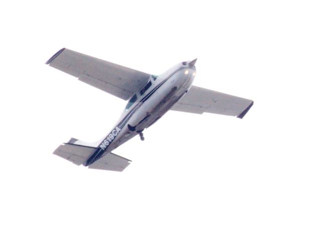 Cessna Centurion (N619CA) - flying around watsonville, California 95076. Circled a neighborhood 3 to 4 times. Aircraft fitted with what looks like an optical device under left side.