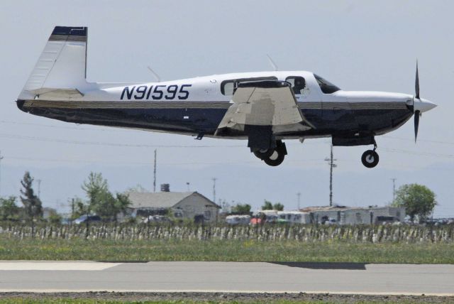 Mooney Mustang (N91595)