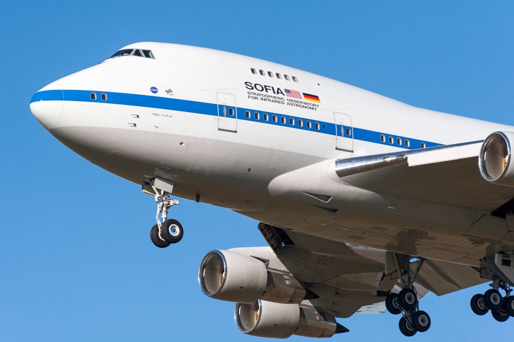 BOEING 747SP (N747NA) - Up close, and getting quite personal as she roars past at 140kts!...NASA's SOFIA B747-SP flying telescope on short final for Christchurch International Airport, after a long flight southward from Hawaii on Monday 6 June 2016. She will be based in Christchurch for 8 weeks, for the long winter nights touring the Southern Ocean at FL400. Shot with my Nikon 300mm/f2.8 telephoto on a D700.