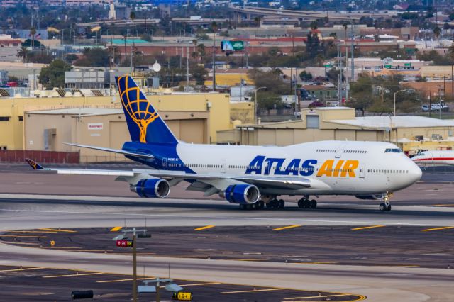 Boeing 747-400 (N481MC) - An Atlas Air 747-400 landing at PHX on 2/13/23, the busiest day in PHX history, during the Super Bowl rush. Taken with a Canon R7 and Canon EF 100-400 II L lens.