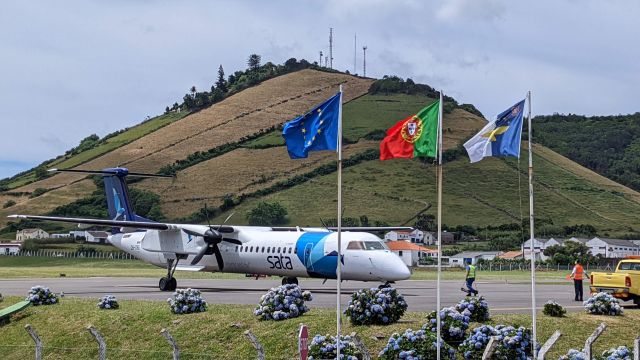 — — - Flores, Azores airport. Standing across the street.