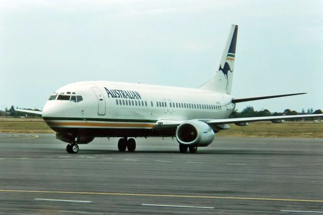 BELL-AGUSTA AB-139 (VH-TJK) - AUSTRALIAN AIRLINES - BOEING 737-476 - REG : VH-TJK (CN 24436/1998) - ADELAIDE INTERNATIONAL SA. AUSTRALIA - YPAD (23/1/1993) 35MM SLIDE CONVERSION.