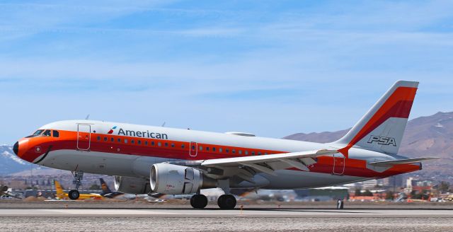 Airbus A319 (N742PS) - Thrust reversers are being deployed as American's PSA heritage liveried Airbus, arriving from Dallas, lands on 16L.