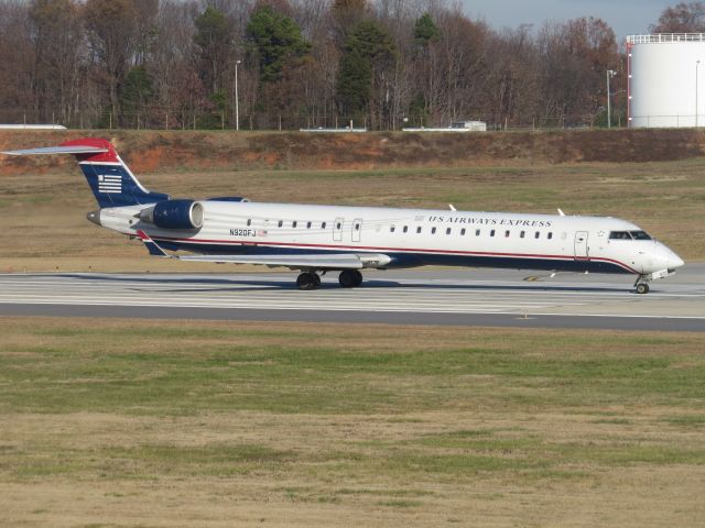 Canadair Regional Jet CRJ-900 (N920FJ) - Taken from airport overlook, Dec. 1, 2013