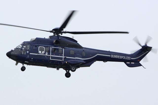 TUSAS Cougar (D-HEGW) - German Police exercising long finals at Geilenkirchen Air-Base.