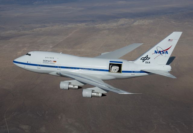 N747NA — - NASA SOFIA: first open door test flight, Dec. 2009. Exposed telescope diam. = 9 ft.