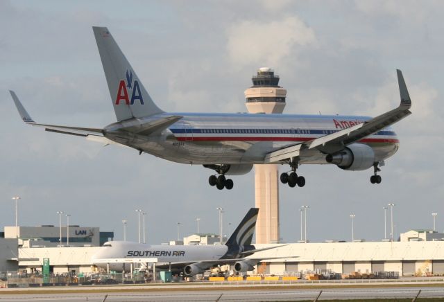 BOEING 767-300 (N359AA) - Check out our aviation videos with 100% authentic and non-leveled sound! a rel=nofollow href=http://youtube.com/ilikeriohttps://youtube.com/ilikerio/abr /br /American 767 on final for 9 with Southern Air 747-200 in the background.