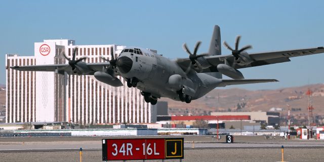 Lockheed C-130 Hercules (96-5300) - The second of a pair of 403 WG "Hurricane Hunters" WC-130J Hercs is just off 16L and beginning to tuck the wheels in the wells as it makes a noon-hour departure from Reno Tahoe International to end a RON visit.