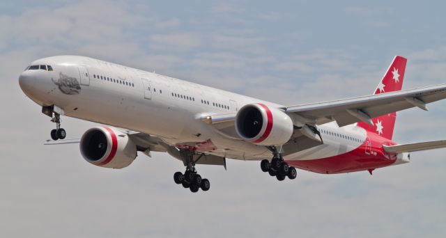 Boeing 777-200 (VH-VPD) - Virgin Australia 777-300ER as flight VAU1 from Sydney touching down on runway 25L at LAX on August 17, 2012.