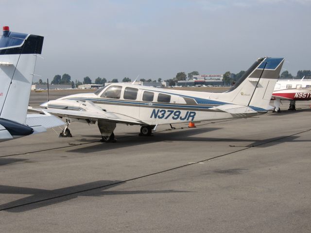 Beechcraft Baron (58) (N379JR) - Parked at Santa Ana