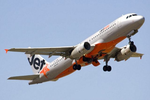 Airbus A320 (VH-VQW) - Getting airborne and heading to an interstate destination on the last day of the Australian summer. Thursday 28th February 2013.