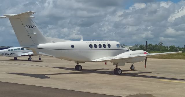 Beechcraft Super King Air 350 (N23327) - USAF B350 parked up at the VIP ramp in BZE 