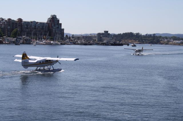 C-FRNO — - Two Beavers taxing past each other.  Victoria gets a large number of Harbour Air flights per day.  At one point 4 were taxing and landing