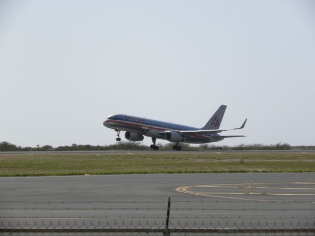 — — - American taking off at PHNL runway 8R