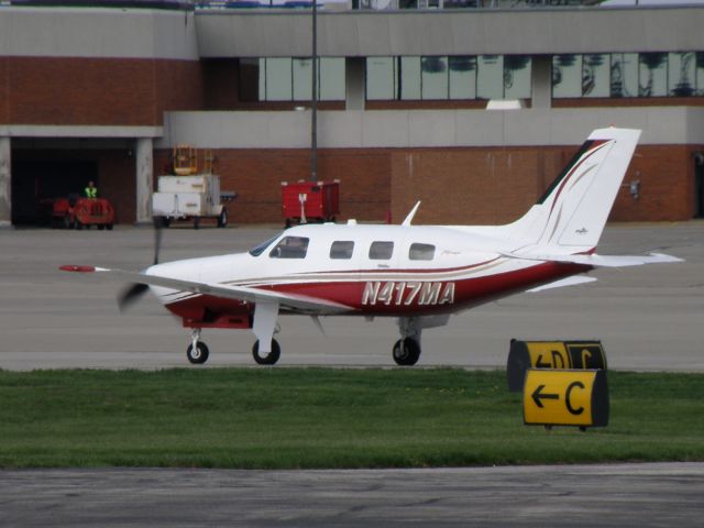 Piper Malibu Mirage (N417MA) - N417MA, A Piper Malibu, taxis along Charlie to the active at Blue Grass Airport (KLEX) bound for Dupont-Lapeer (D95)