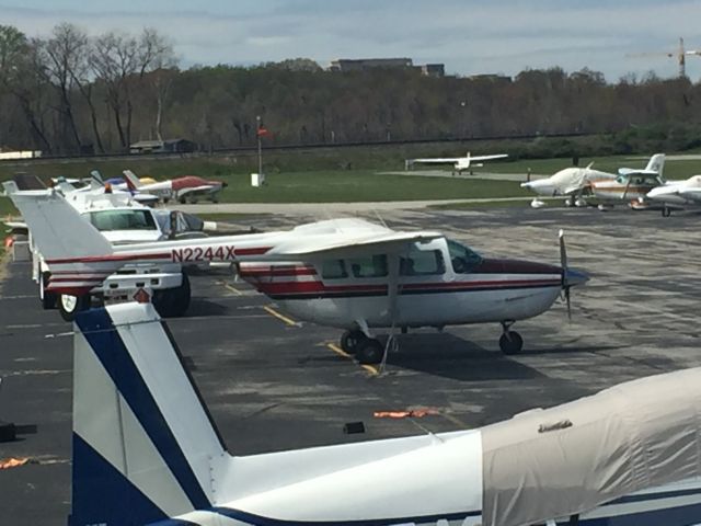 Cessna Super Skymaster (N2244X) - Cessna 377 N2244X. Picture taken from the deck at the FBO at the College Park Airport.