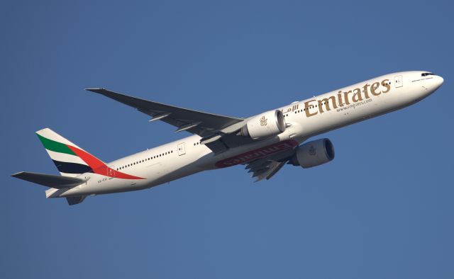 BOEING 777-300ER (A6-EGI) - Climbing from Rwy 34L