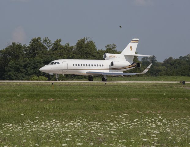 Dassault Falcon 900 (N700FL) - Falcon 900 aircraft landing at Georgetown-Scott County Airport (27K), Georgetown, Kentucky - a nice summer day in the Bluegrass!